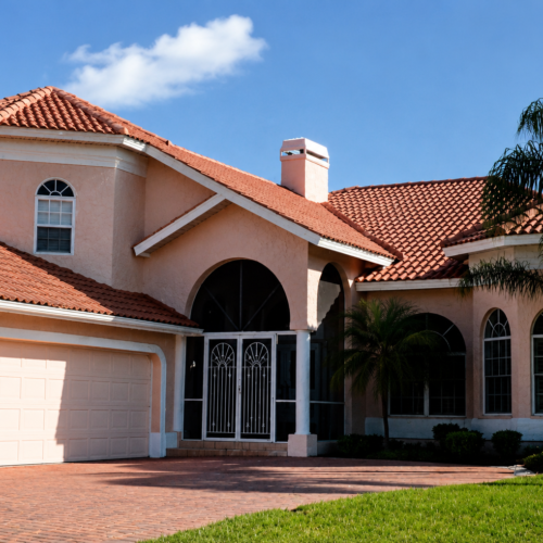 Project Archive addition mediterranean style home in midday sun.webp