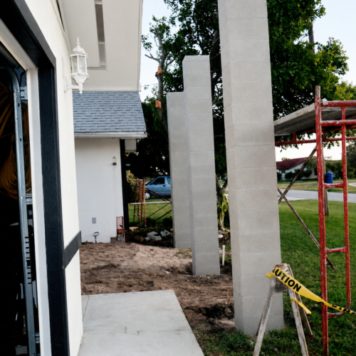 Project Archive addition suburban home construction in progress.webp