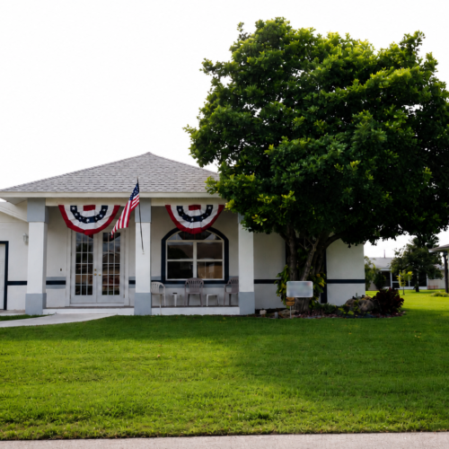 Project Archive addition suburban home with patriotic decor.webp