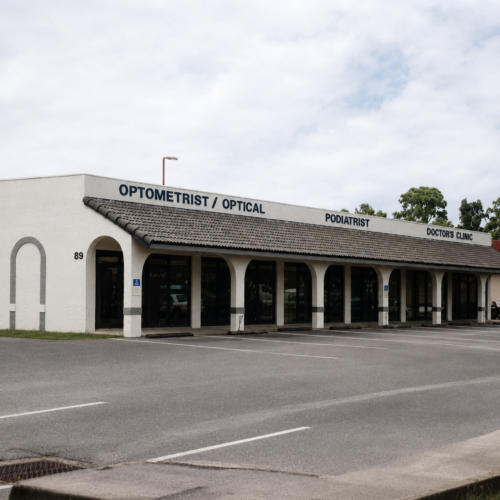 Project Archive commercial quiet suburban medical plaza on a cloudy day