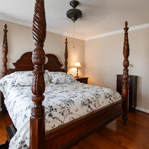 Project Archive custom home cozy traditional wooden bedroom interior