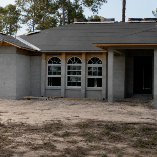 Project Archive custom home house under construction in pine forest