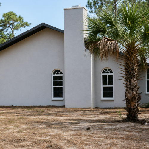 Project Archive custom home sunny day in a simple house yard