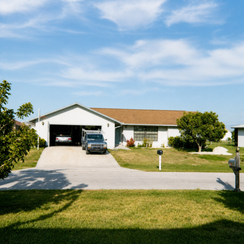 Project Archive custom home sunny suburban ranch house view