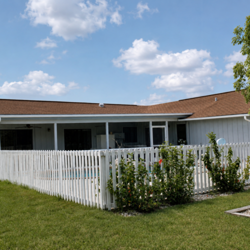 Project Archive outdoor sunny suburban backyard with pool and fence