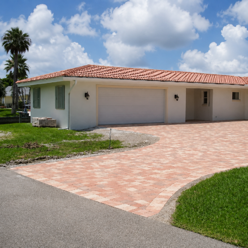 Project Archive renovation sunny suburban driveway and house scene